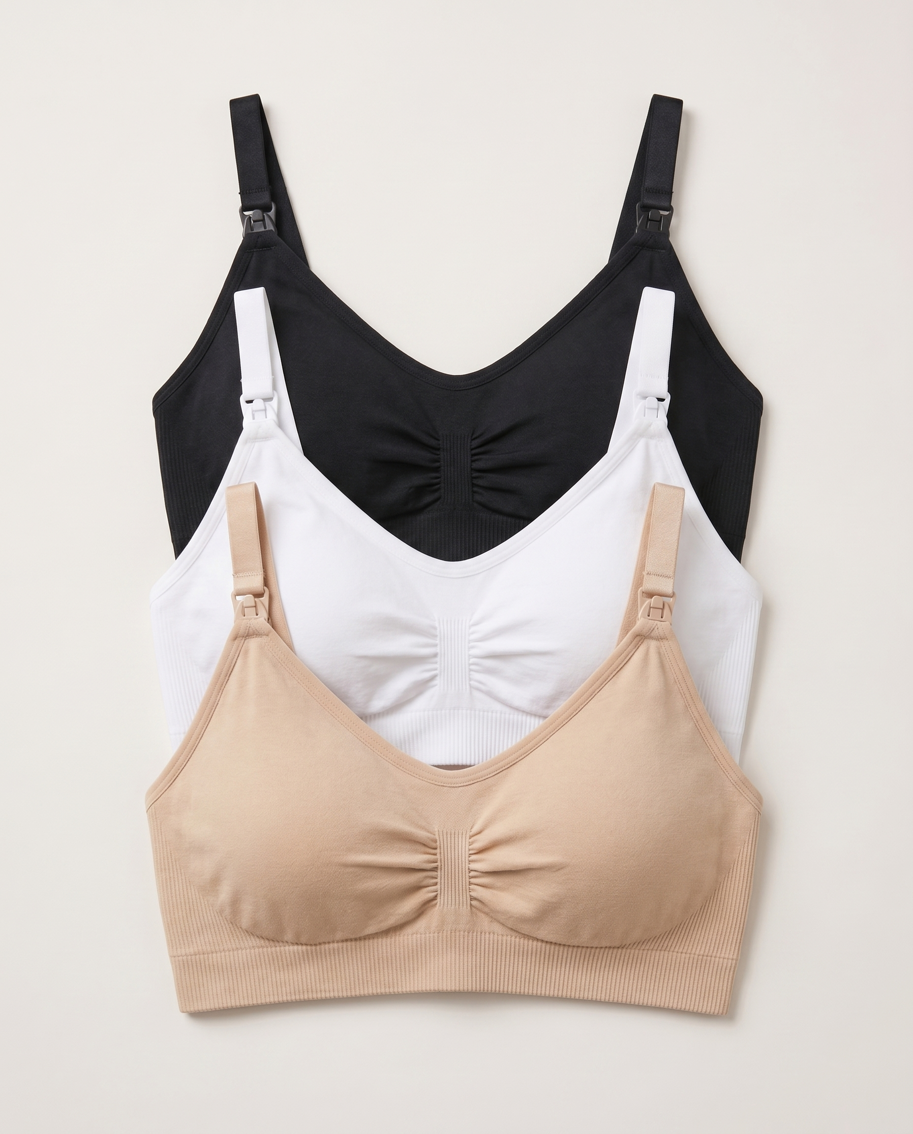 YOMA BabyMama Still-BH 3er Set – drei BHs nebeneinander